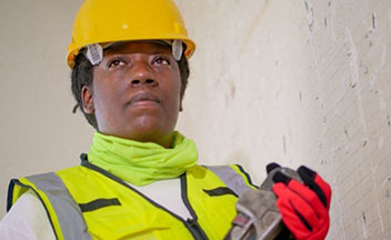 woman holding tools.