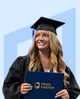woman in cap and gown holding diploma.