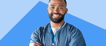 man in blue scrubs over white long sleeve shirt on blue background.