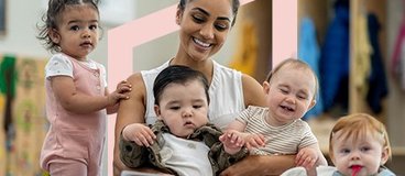 Woman reading to four young children.