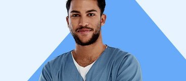 Man in blue scrubs on blue background.