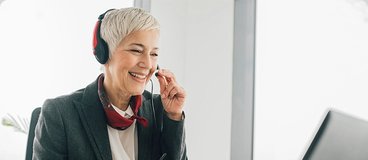 woman speaking on the phone in an office