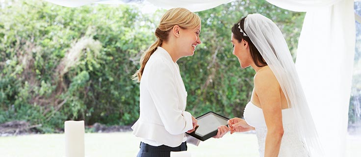 wedding planner talks to bride.