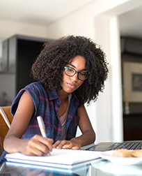 student at computer studying.