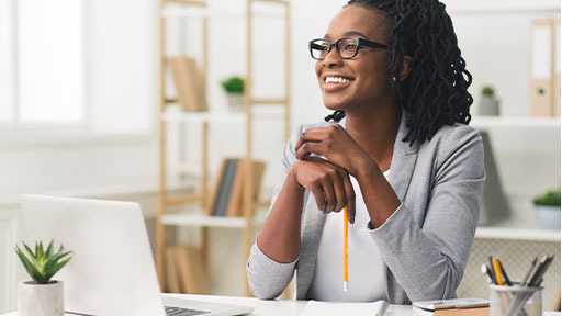 legal secretary working on laptop