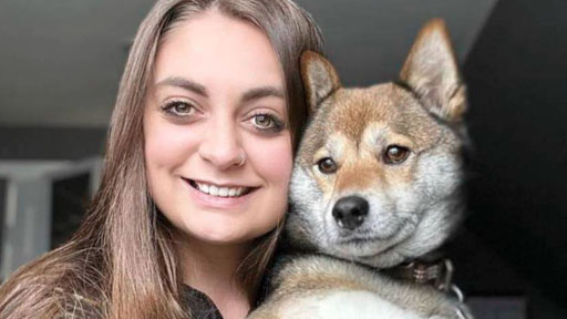 Penn Foster Vet Tech student with dog. 